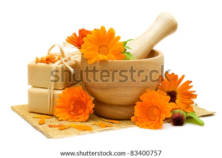 Calendula flowers with bath soap isolated - Alternative medicine and herbal treatment