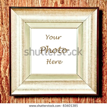 The Vintage blank of frame on wood background
