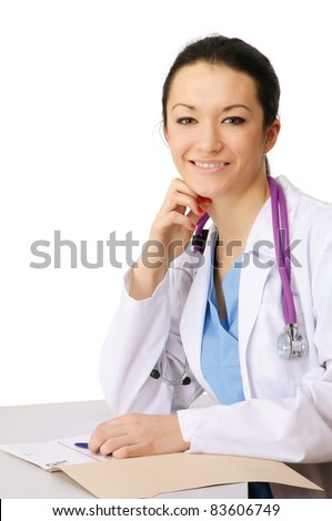 Female doctor or nurse sitting at desk, isolated on white