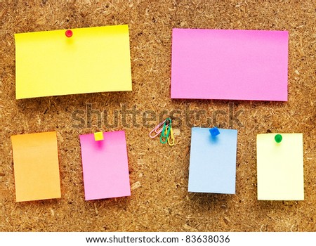 empty notes on old wooden background