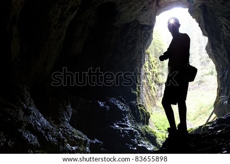 Tourist in the Occidental Carpathians, Radesei Cave, Romania Royalty-Free Stock Photo #83655898