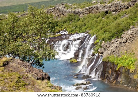 Icelandic mountain waterfalls landscape in summer time