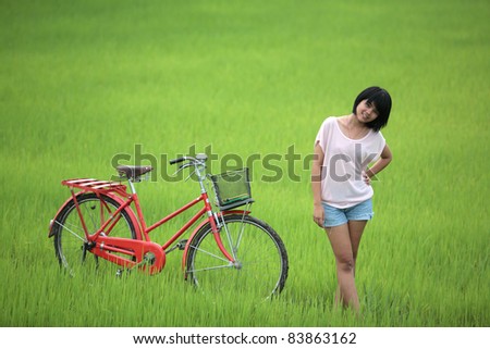 happy girl in paddy field.