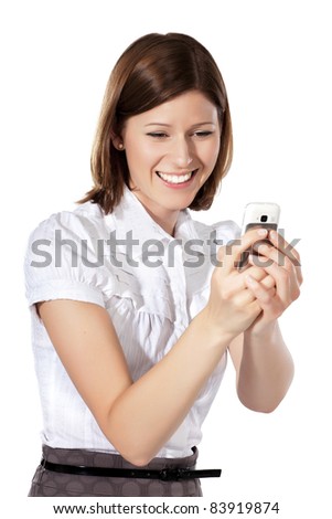 Portrait of a young beautiful businesswoman laughing at something funny in her phone