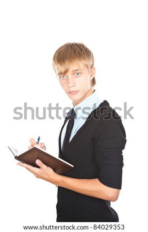 a young man standing with a notebook in hand, isolated over white
