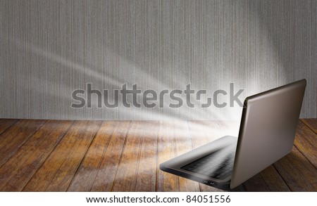 laptop on table with light out