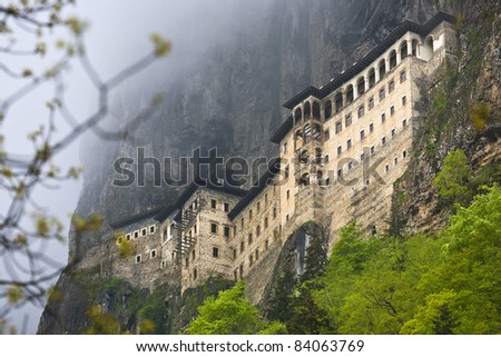 Turkey. Region Macka of Trabzon city - Altindere valley. The Sumela Monastery - 1600 year old ancient Orthodox monastery of the Panaghia located at a 1200 meters height on the steep cliff Royalty-Free Stock Photo #84063769