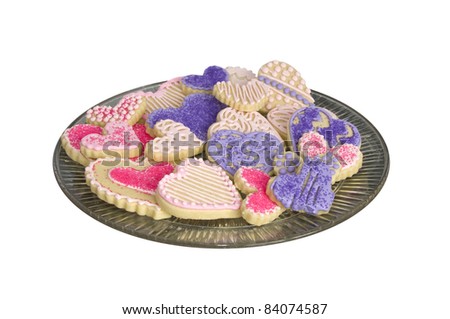 Pink purple and white heart shaped sugar cookies isolated on white