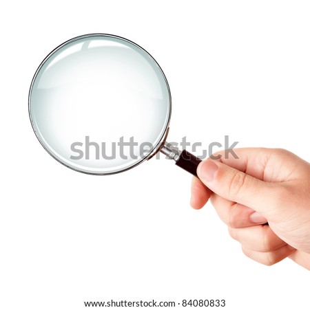 Man's hand, holding classic styled magnifying glass, closeup isolated on white background, copy space for your image or text Royalty-Free Stock Photo #84080833