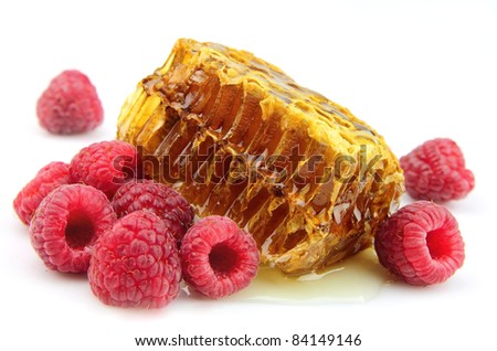 raspberries and honeycomb close up