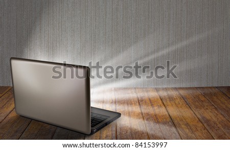 laptop on table with light out