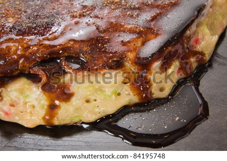 Japanese food close-up Okonomiyaki.(Japanese pizza)