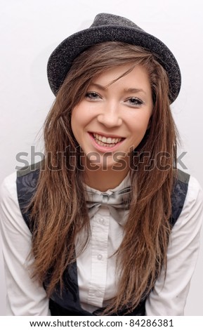 Portrait of smiling girl in a hat