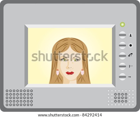 Intercom with video display. Woman using an intercom.
