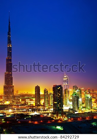 Dubai downtown night scene with city lights, luxury new high tech town in middle East, United Arab Emirates architecture Royalty-Free Stock Photo #84292729