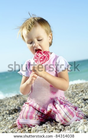  little girl with lollipop