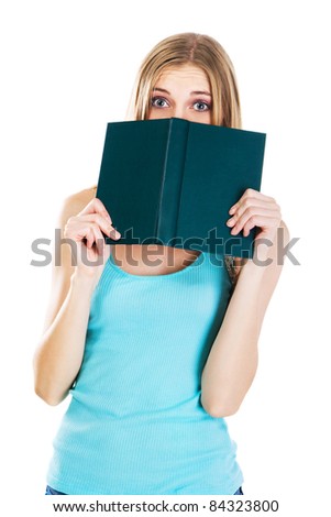 Frightened girl with a book, white background
