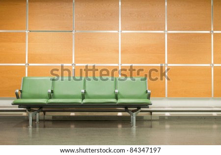empty seats at a business building against a wooden wall (gorgeous interior setting) Royalty-Free Stock Photo #84347197