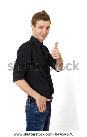 Happy casual young man showing thumb up on white background