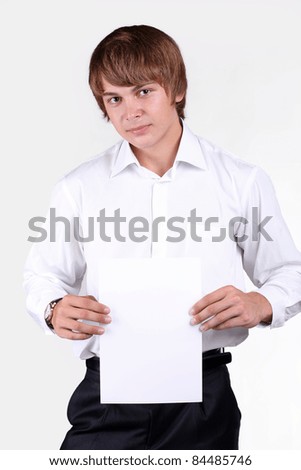 Handsome business man shows your text, white banner