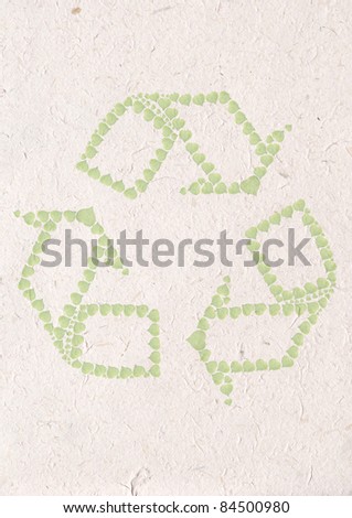 recycle paper craft, ecology concept with heart of green leaves in recycle sign on recycle paper