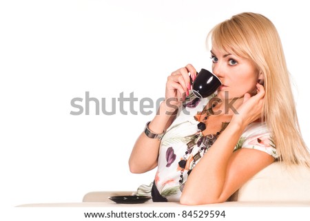 portrait of a cute girl with a cup of coffee