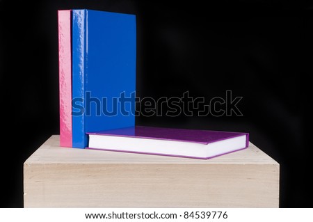 three colorful  books perfect for cutout