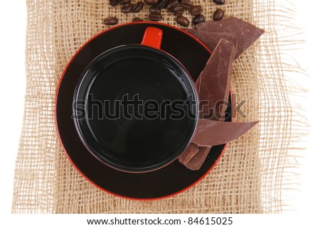 black coffee with dark chocolate and beans