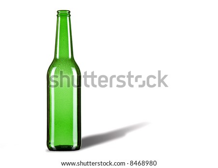 Green beer bottle against white background. Bubbles inside.