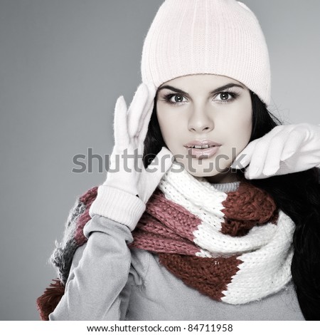 A photo of beautiful girl is in winter clothes