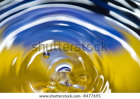 water droplets, multi-coloured water, soft focus, abstract background