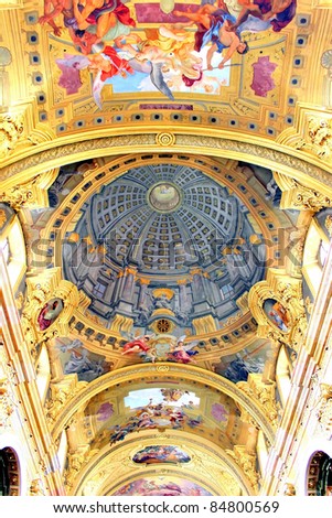 The remarkable trompe l'oeil dome of the Jesuit Church (Jesuitenkirche), a two-floor, double-tower church in Vienna, Austria, influenced by early Baroque principles but remodeled in 1703-1705.