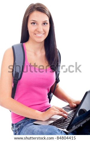 happy young female student with a laptop, isolated on white background