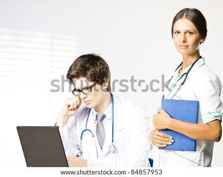Doctor and nurse at doctors office