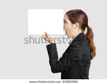 Woman holding a  paper sheet with a sketch of pinnochio nose on it