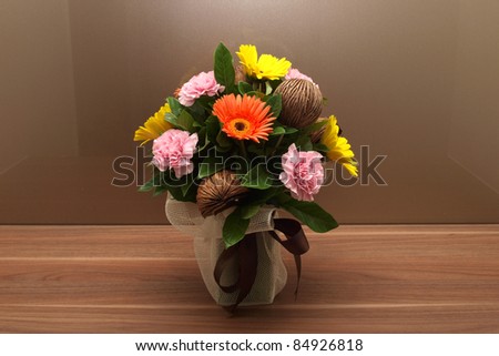 Flowers in vase at the table