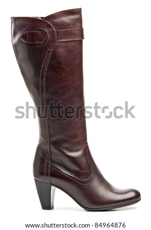 Brown knee high boot over white