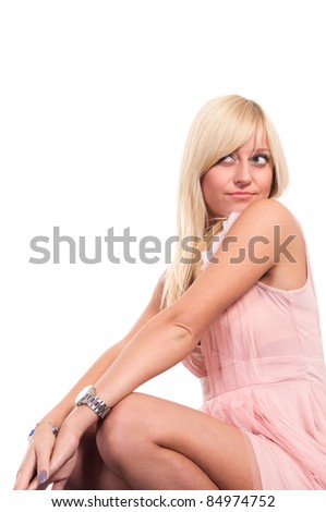 cute blonde posing on a white background