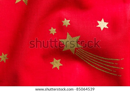 photo shot of stars on red fabric