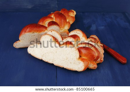 sweet bread : french bread cuts over blue wooden table