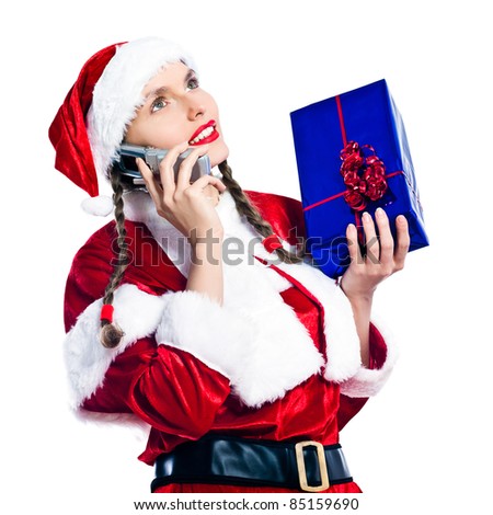one woman dressed as santa claus holding christmas presents gifts on the telephone studio isolated white background