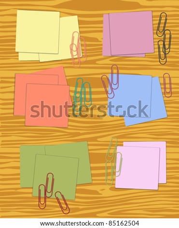 Collection of sticky notes in different colors with paperclips, raster