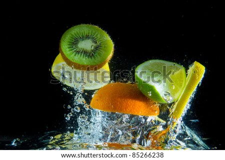 fruit splashing in the water