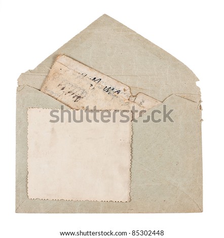 vintage envelope with old postcards isolated on white background