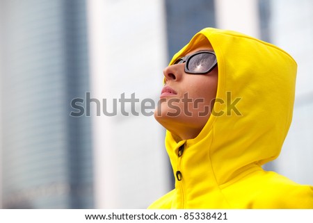 portrait of a young girl in a yellow hood