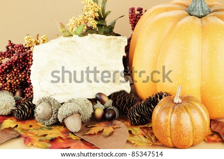 Autumn display with blank paper for free space for text.