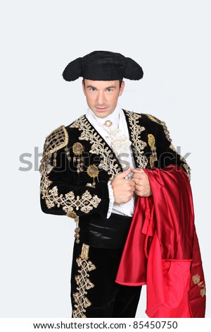 Man dressed as Spanish bull fighter Royalty-Free Stock Photo #85450750