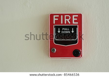 The Fire alarm embedded in the wall background