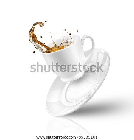 Splash of tea in the falling cup isolated on white
