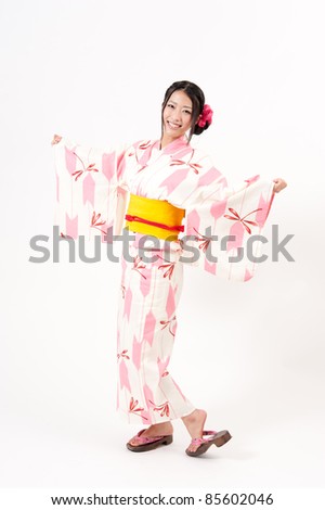 a portrait of japanese kimono woman isolated on white background